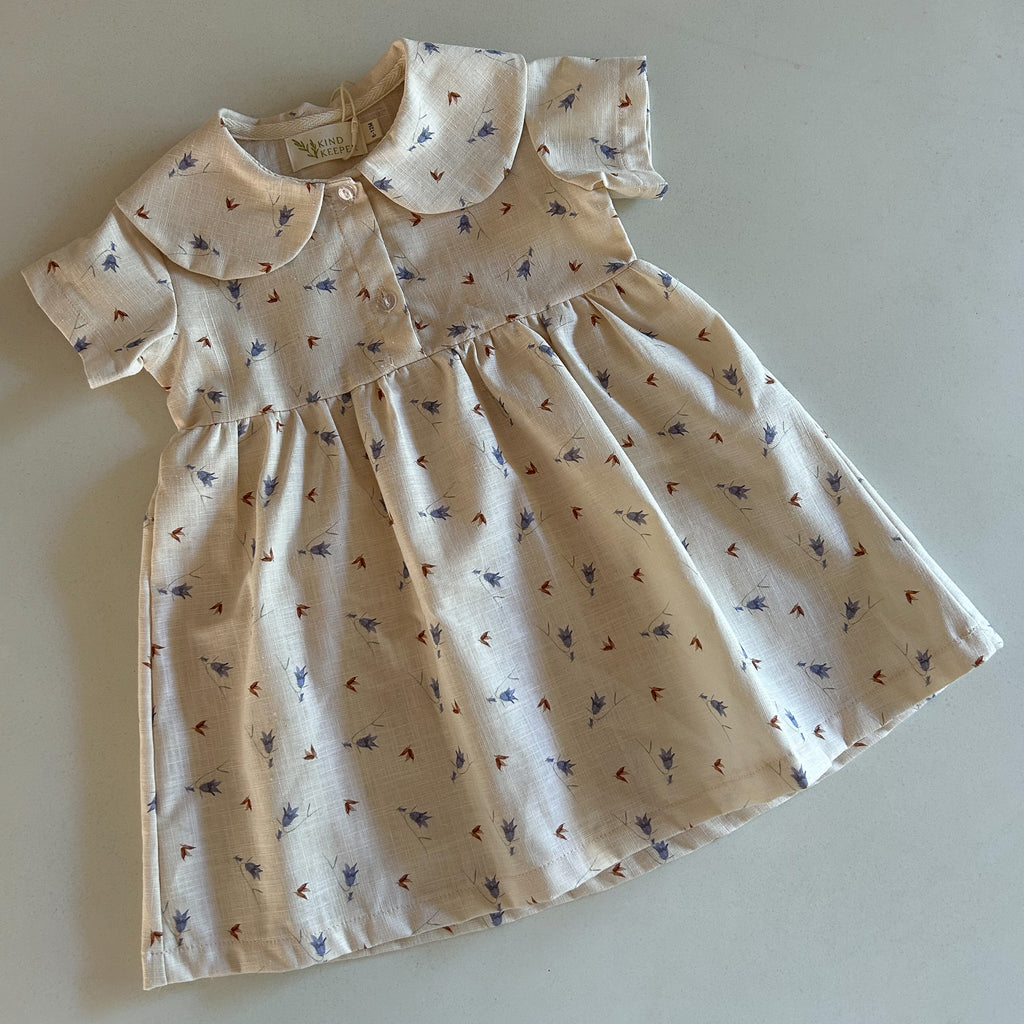 simple, delicate bluebell floral print on neutral latte cream fabric, perfect for lovers of subtle, natural tones