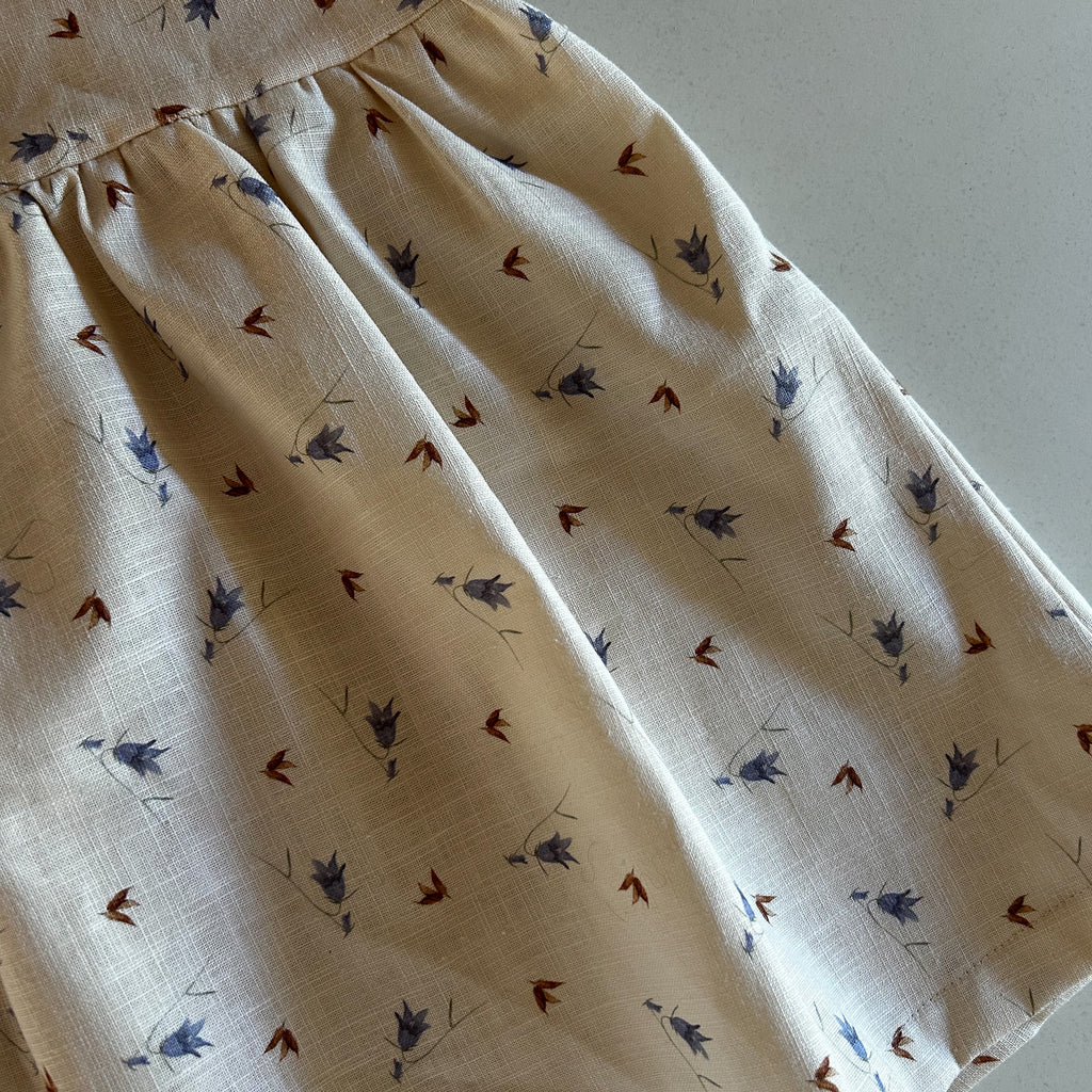 simple, delicate bluebell floral print on neutral latte cream fabric, perfect for lovers of subtle, natural tones